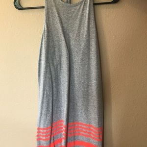 Grey dress with orange stripes on bottom.